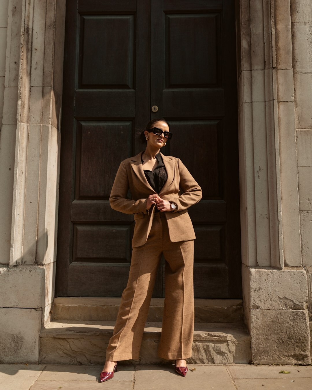 woman wearing sustainable luxury outfit